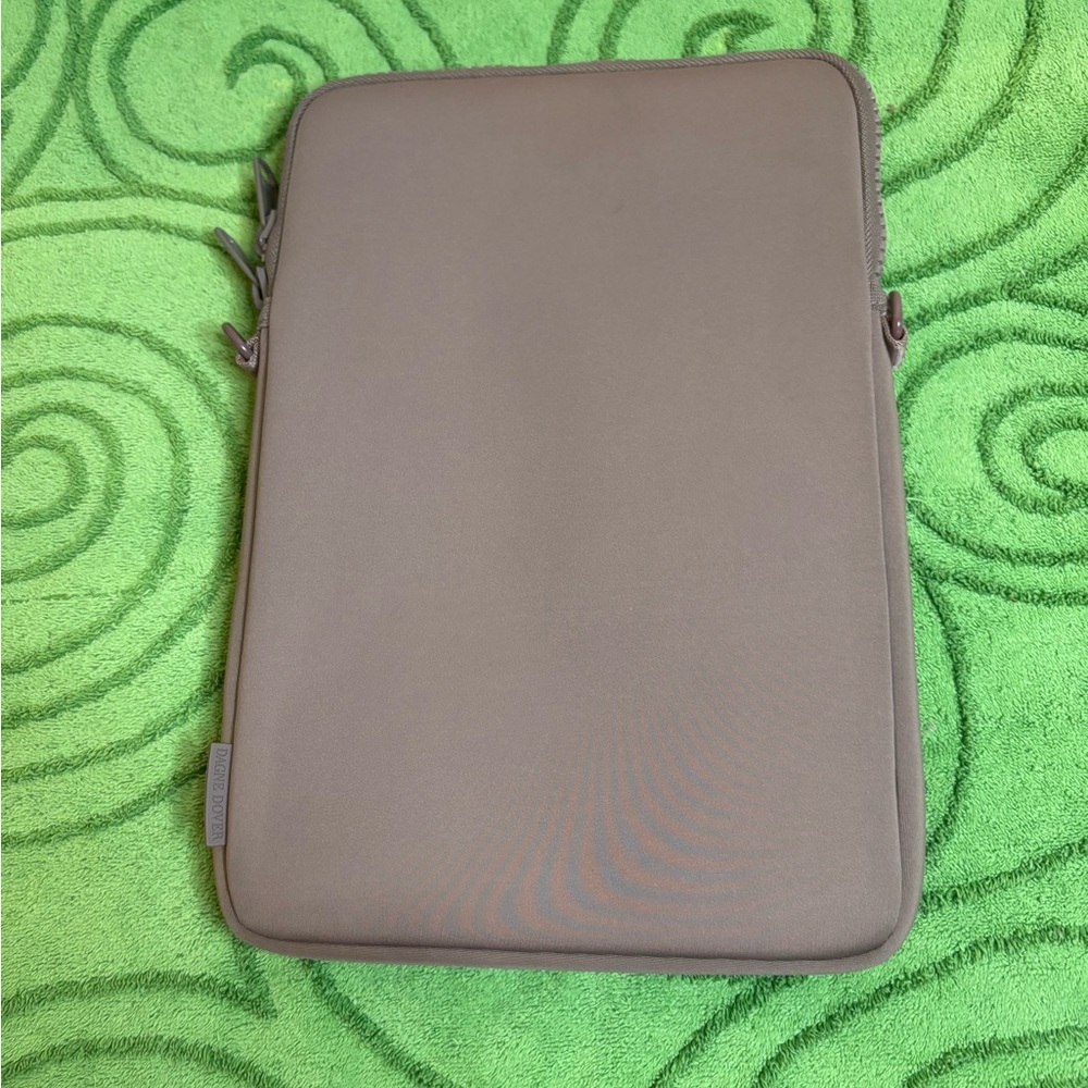 tablet sleeve by Dagne Dover. 
Dark tan cushioned neoprene
